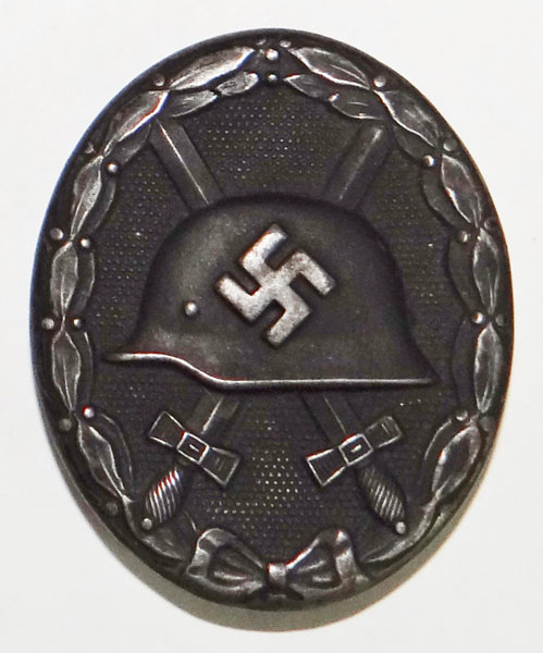 "65" Maker Marked WW II Black Wound Badge "65" Maker Marked WW II Black Wound Badge