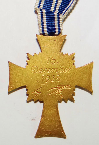 CASED Gold Mothers Cross