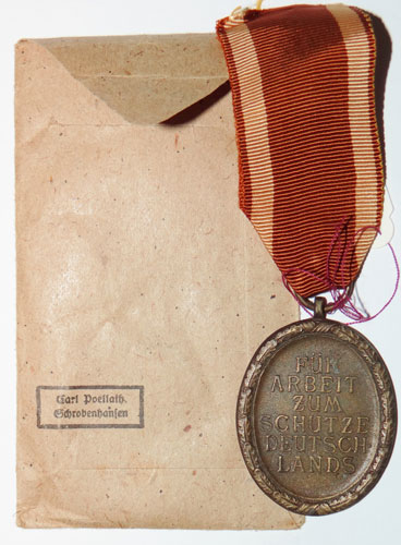 West Wall Medal with Paper Award Packet