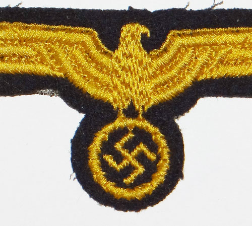 Kriegsmarine "Kapitanleutnant" Shoulder Board with Defensive Ordnance Career Insignia